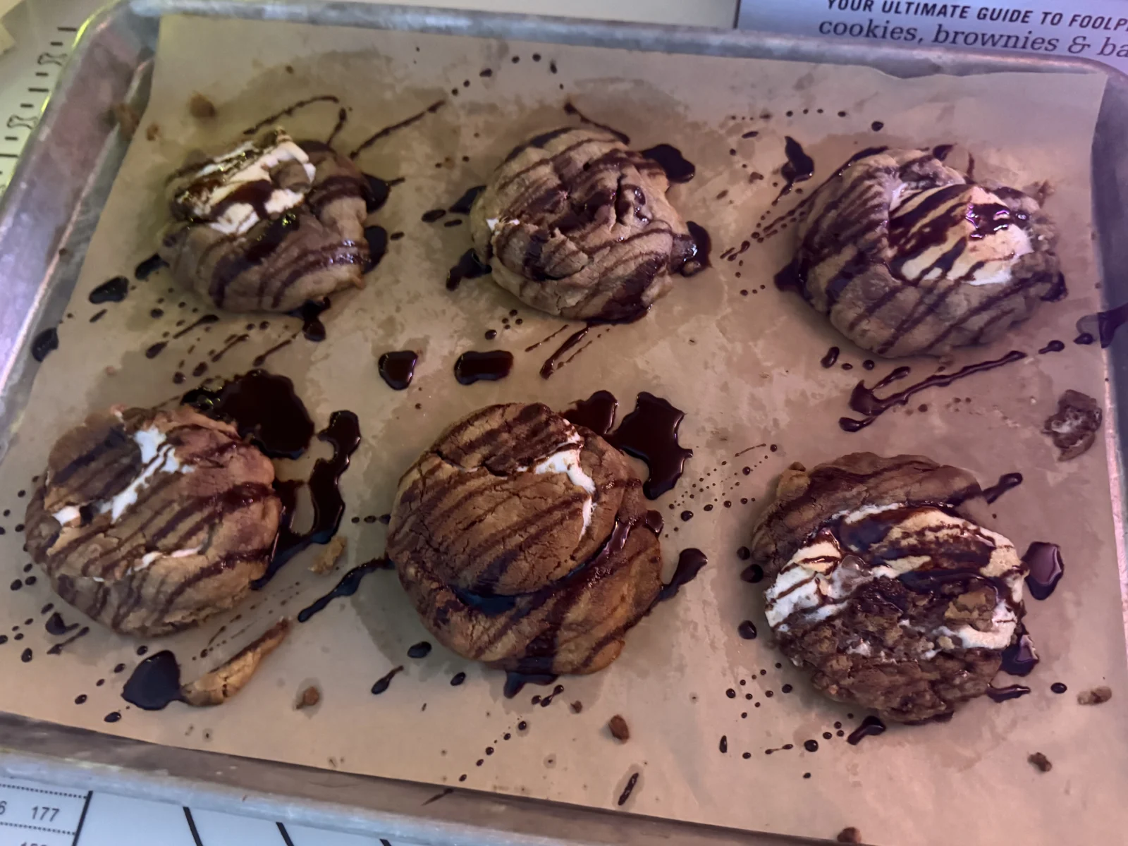 Fresh tray of chocolate-drizzled cookies